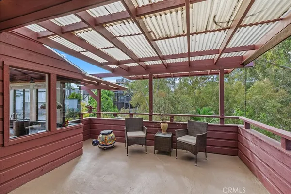 a sitting area with furniture on deck