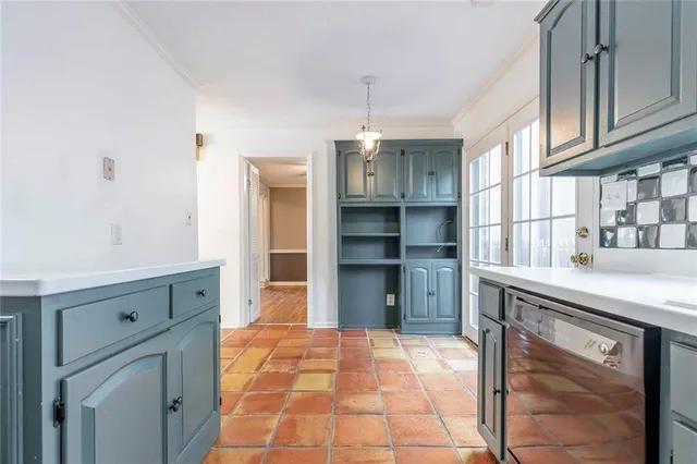 a kitchen with stainless steel appliances a refrigerator and a sink