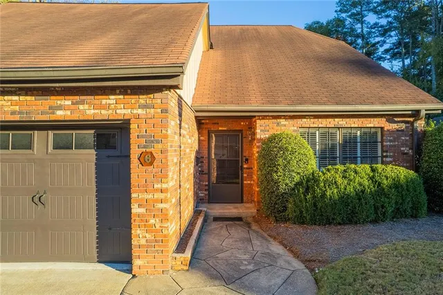 a view of entrance gate of a house