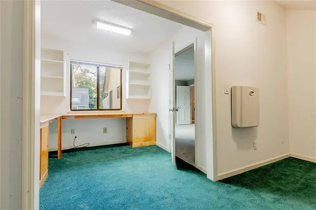 a view of an entryway with a livingroom