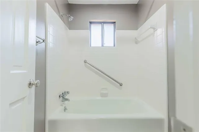 a bathroom with a bathtub