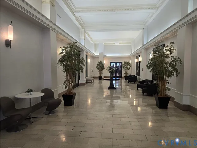 a view of swimming pool with seating area
