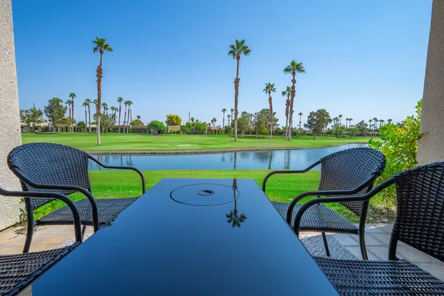 a view of a chairs in a park