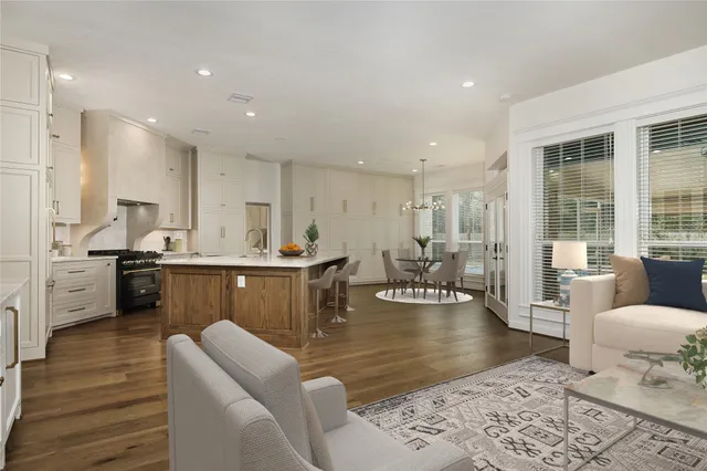 a spacious bathroom with a tub shower and sink