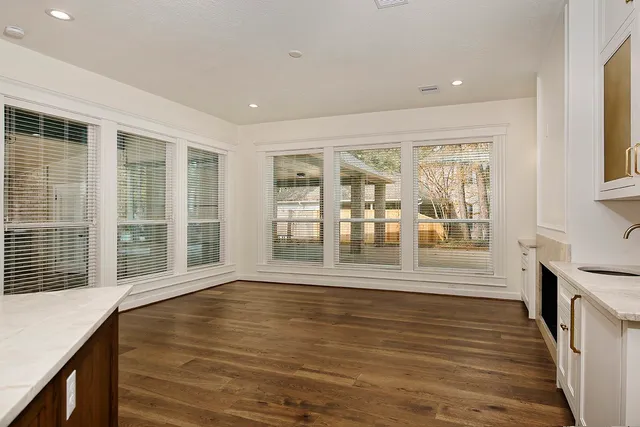 a bathroom with a sink a mirror and a toilet