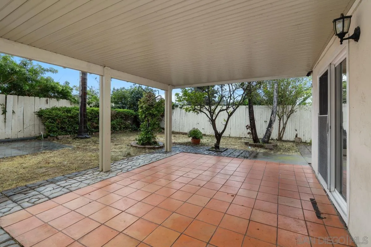 348 Sychar Road San Diego, CA 92114 - Photo 19 of 30 a backyard of a house with garden barbeque oven and glass table