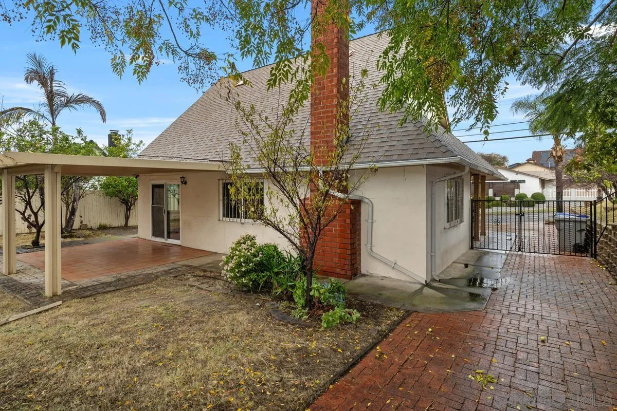 348 Sychar Road San Diego, CA 92114 - Photo 22 of 30 a front view of a house with garden