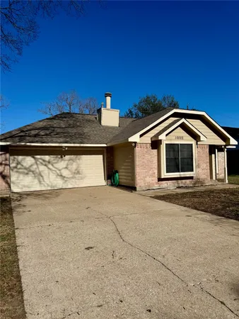 a view of a house with a roof deck