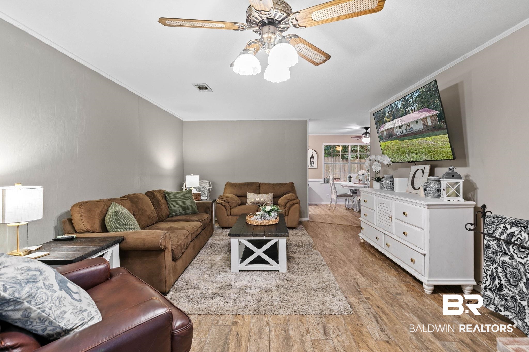 4 Rally Road Spanish Fort, AL 36527 - Photo 13 of 41 Living area featuring ornamental molding, light wood-style floors, and ceiling fan