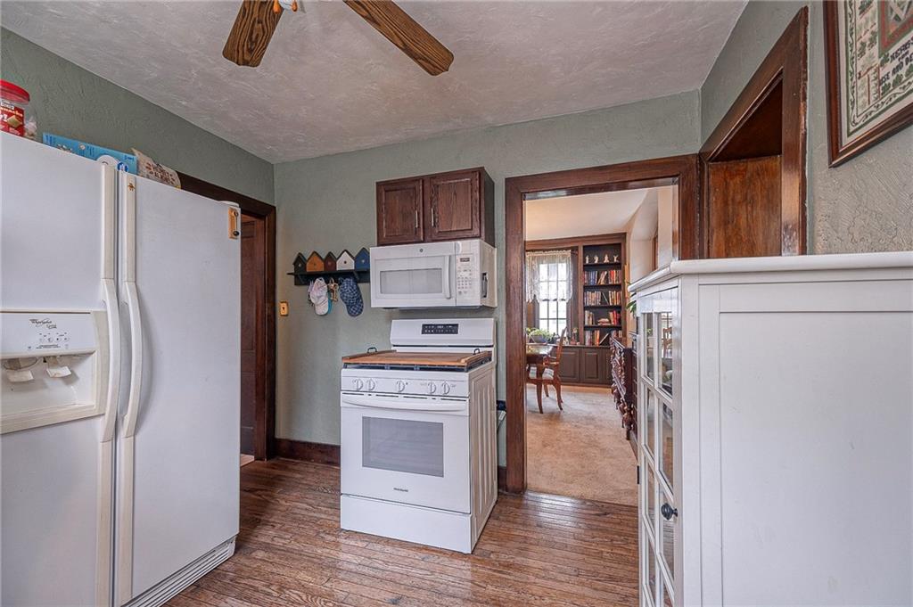 451 Walnut Street Pittsburgh, PA 15238 - Photo 13 of 40 a kitchen with stainless steel appliances a refrigerator and a stove