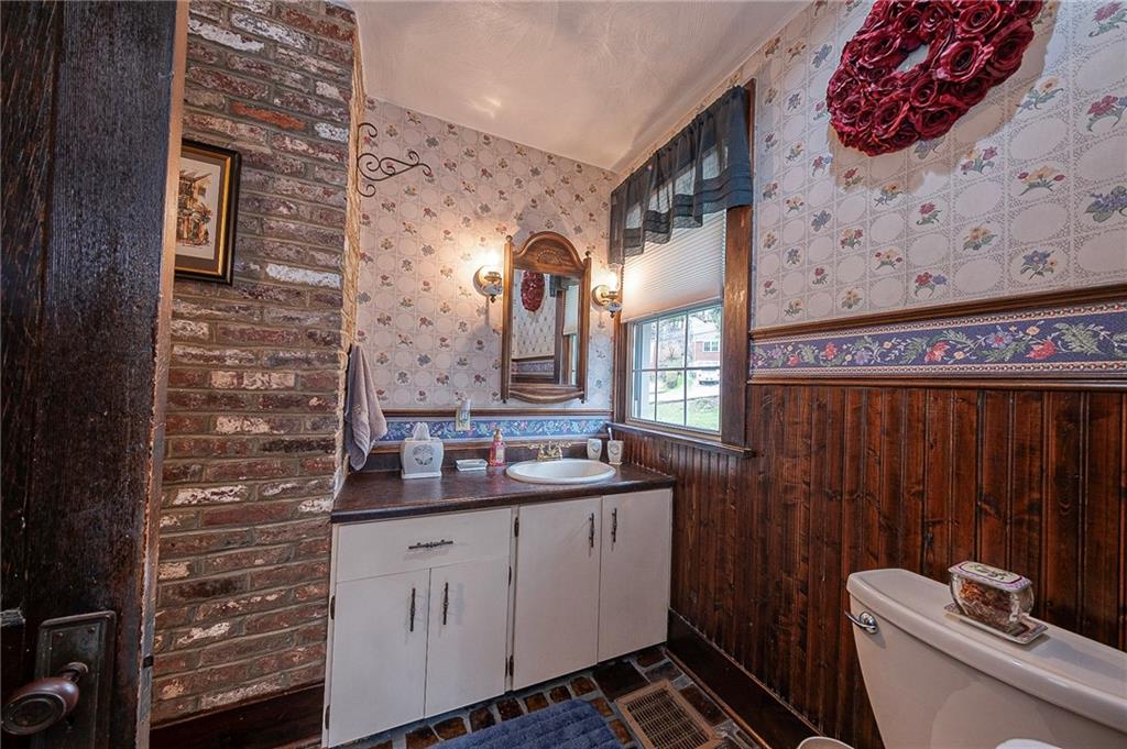 451 Walnut Street Pittsburgh, PA 15238 - Photo 17 of 40 a bathroom with a sink and a mirror