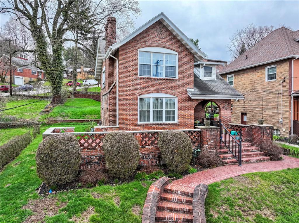 451 Walnut Street Pittsburgh, PA 15238 - Photo 2 of 40 a front view of a house with garden