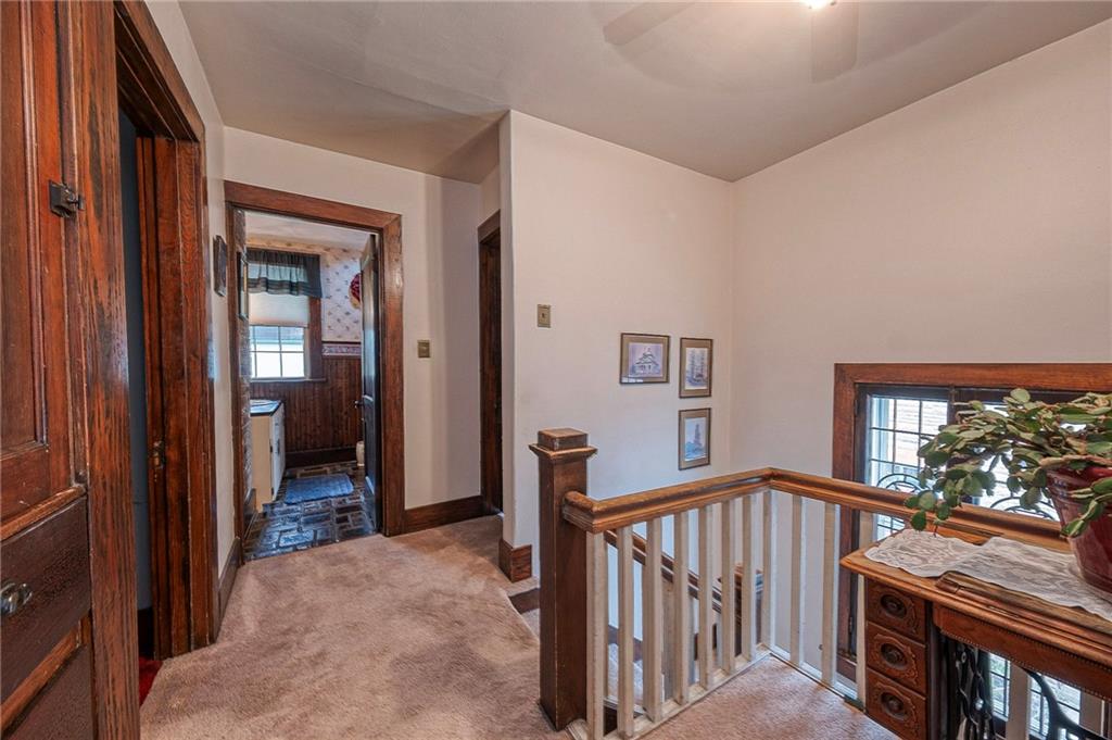 451 Walnut Street Pittsburgh, PA 15238 - Photo 24 of 40 a view of a hallway with wooden floor and stairs