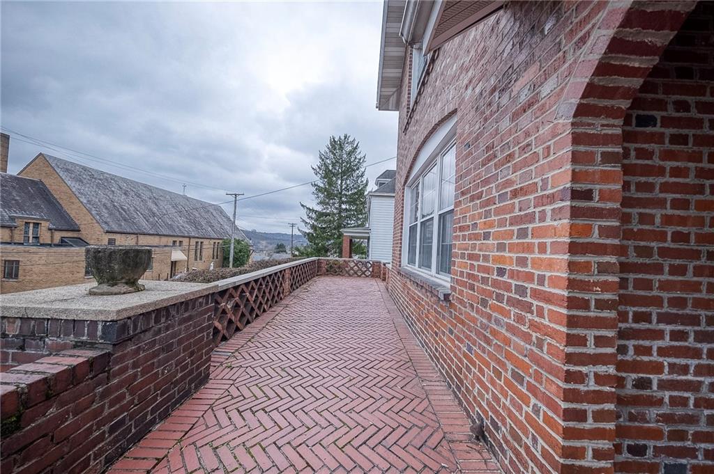 451 Walnut Street Pittsburgh, PA 15238 - Photo 5 of 40 a view of a brick house with a large windows