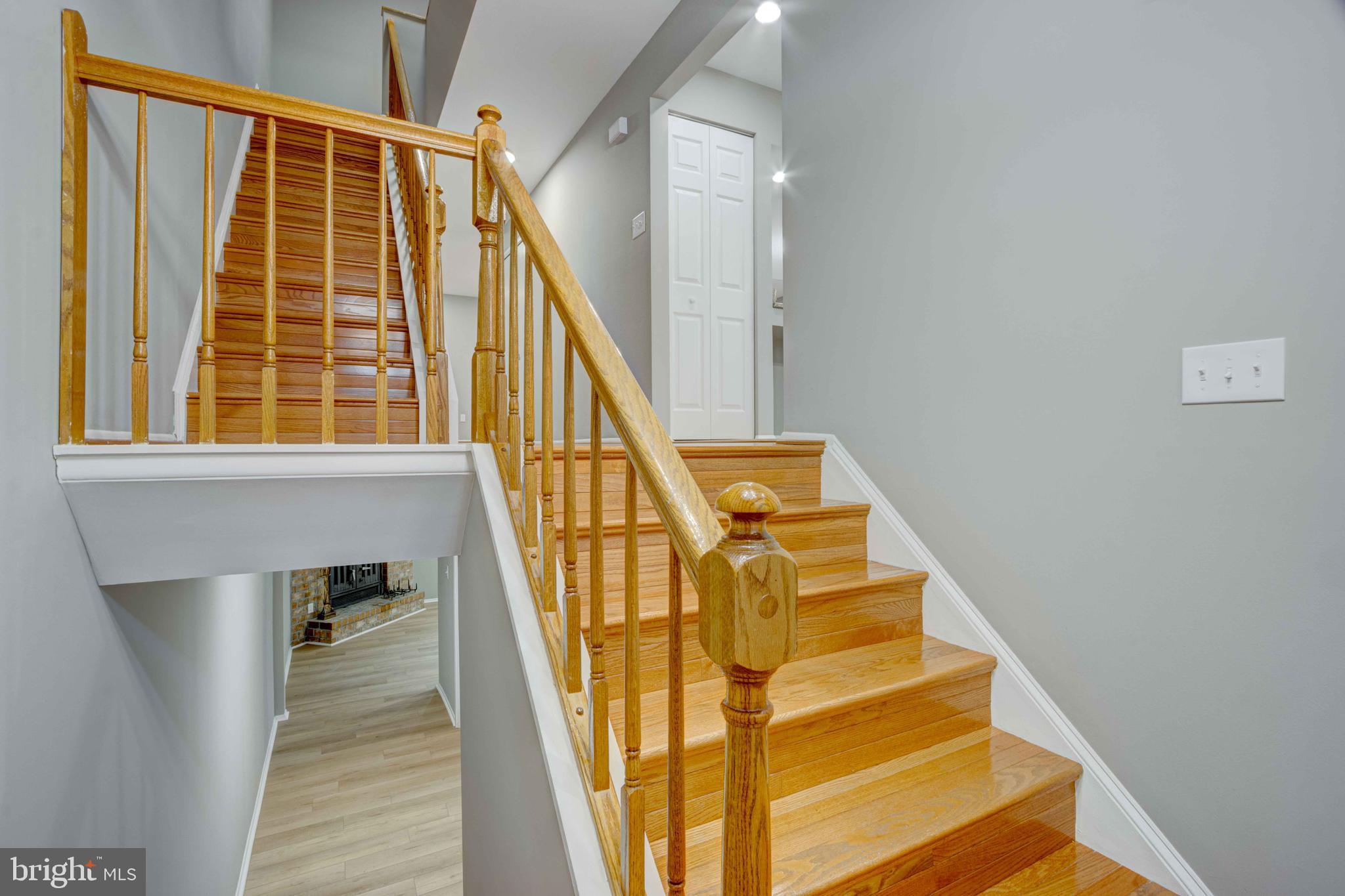 11859 Blue February Way Columbia, MD 21044 - Photo 2 of 35 a view of staircase with railing and a window