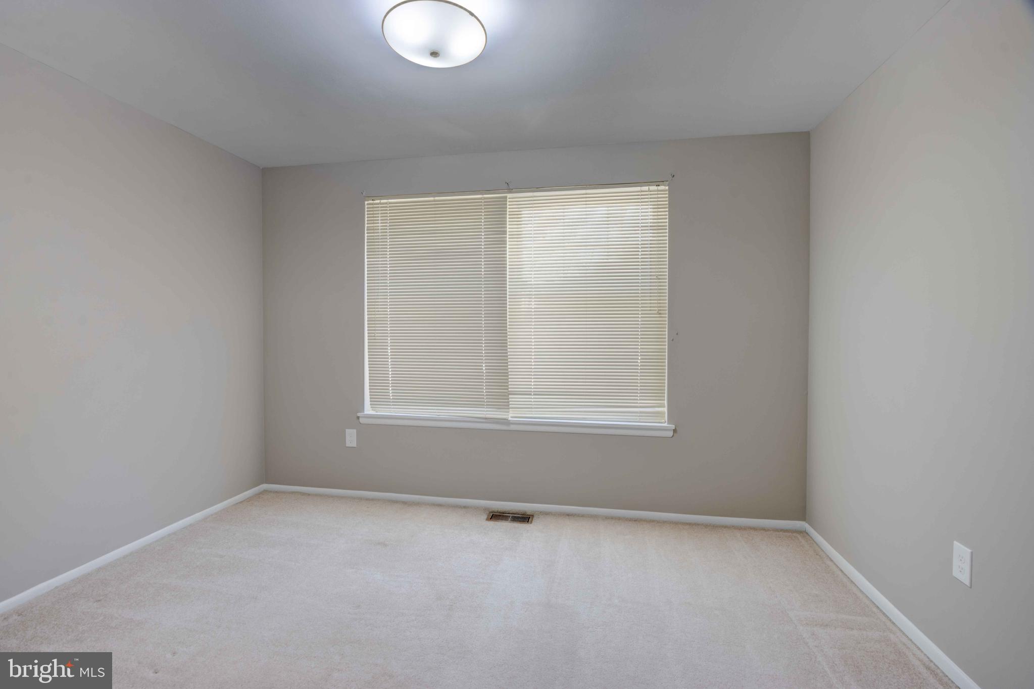 11859 Blue February Way Columbia, MD 21044 - Photo 21 of 35 an empty room with a window