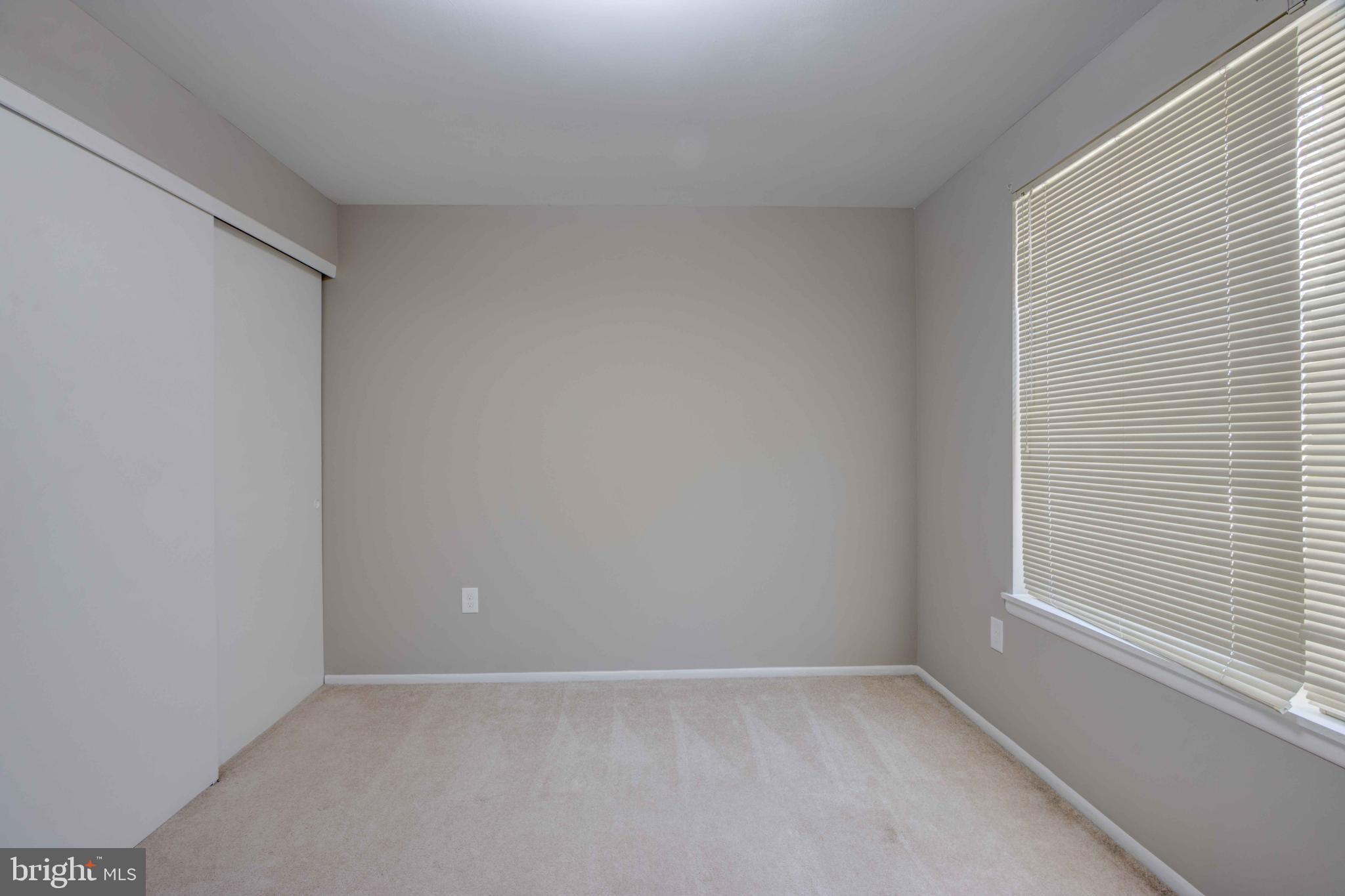 11859 Blue February Way Columbia, MD 21044 - Photo 22 of 35 an empty room with a window