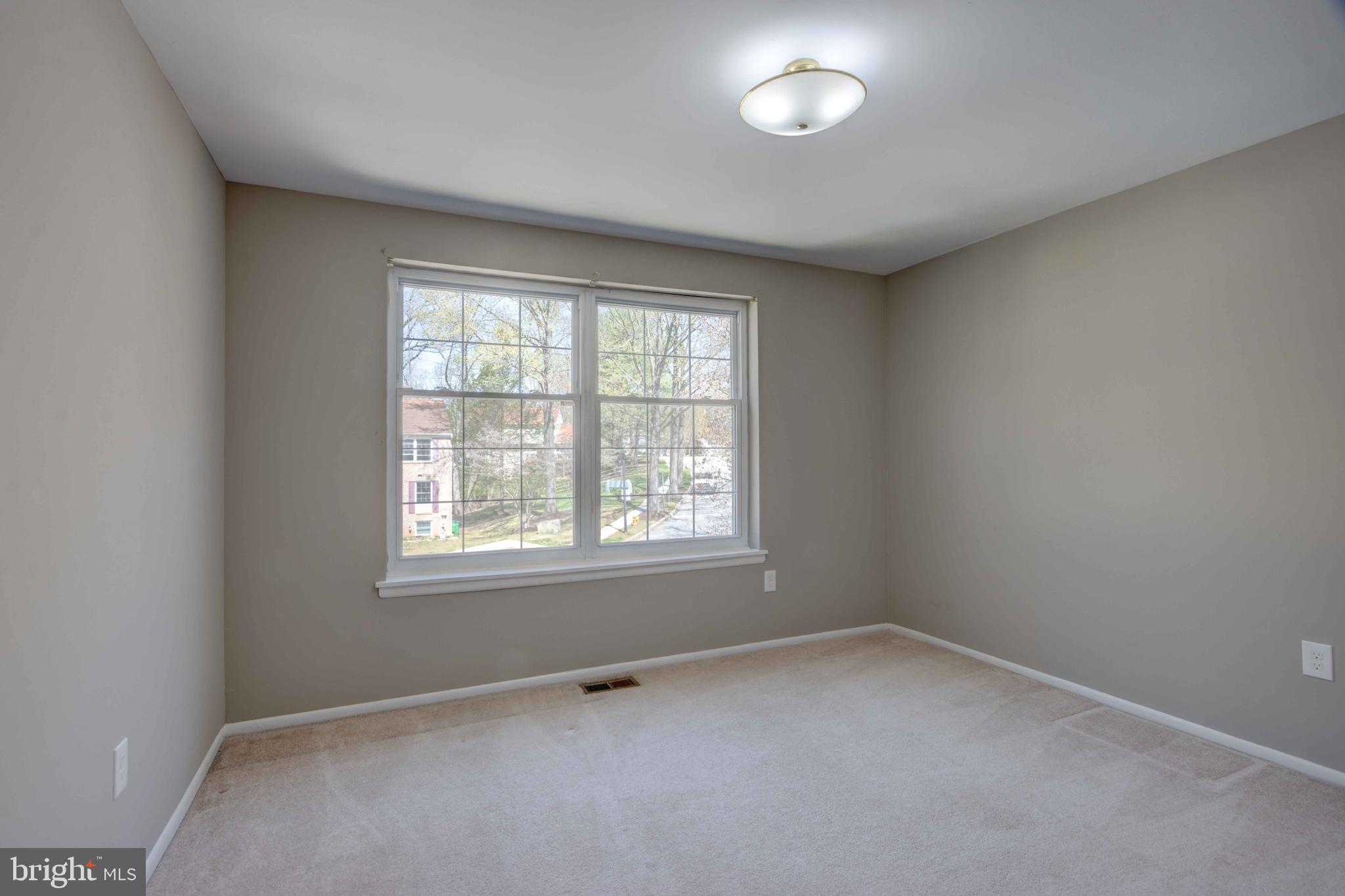 11859 Blue February Way Columbia, MD 21044 - Photo 23 of 35 an empty room with a window