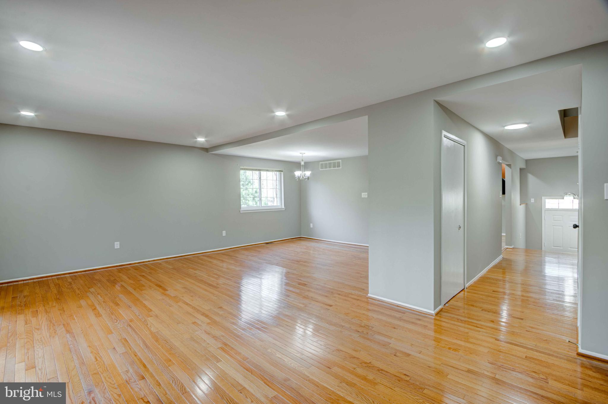 11859 Blue February Way Columbia, MD 21044 - Photo 6 of 35 a view of empty room with wooden floor