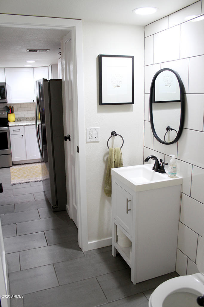 3511 East Baseline Road, Unit 1257 Phoenix, AZ 85042 - Photo 9 of 25 Downstairs Half Bath