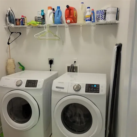 a utility room with dryer and washer
