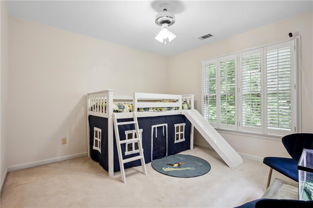 12480 Magnolia Circle Alpharetta, GA 30005 - Photo 18 of 19 a view of livingroom with furniture and window