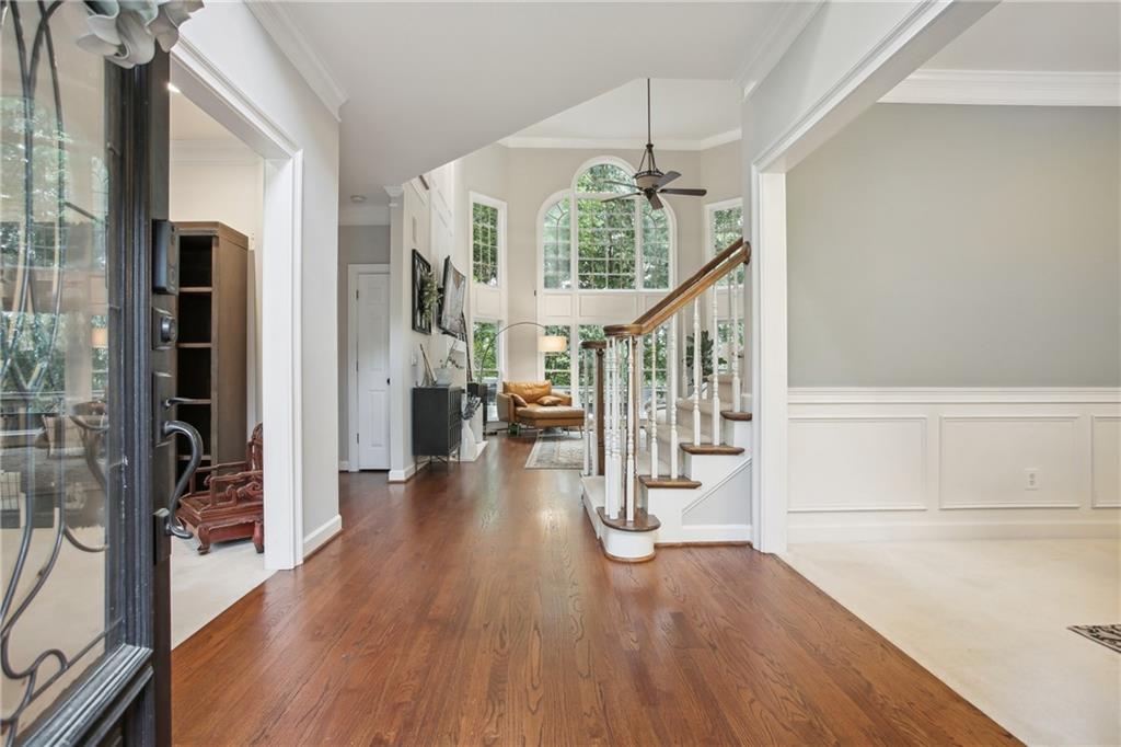 12480 Magnolia Circle Alpharetta, GA 30005 - Photo 2 of 19 a view of entryway and hall with wooden floor