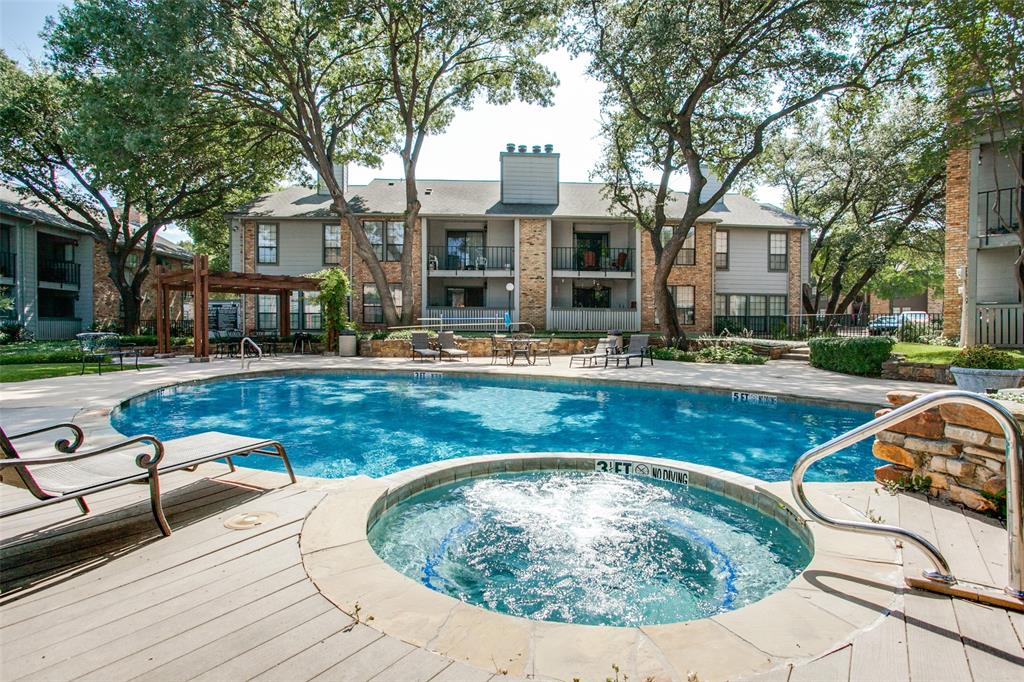 15151 Berry Trail, Unit 407 Dallas, TX 75248 - Photo 15 of 16 a view of a house with pool