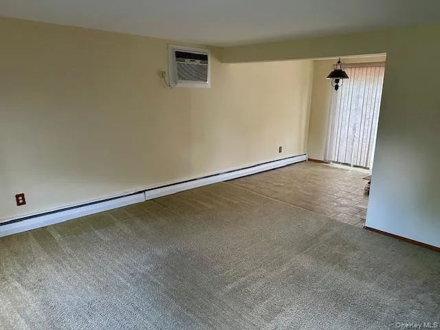 a view of a room with an empty space