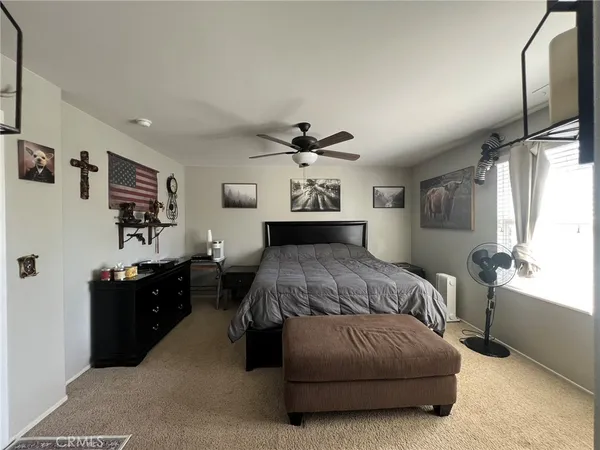 a bathroom with a toilet sink and shower