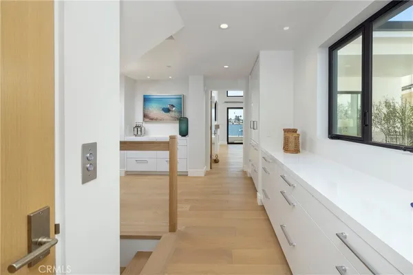 a view of a hallway with staircase