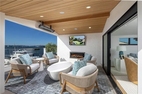 a view of a balcony with chairs