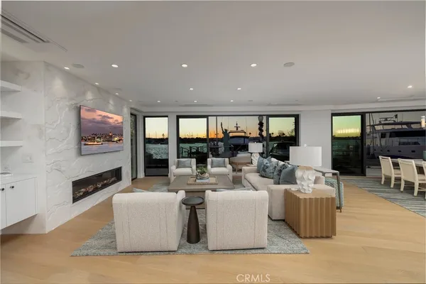 a kitchen with living room and furniture
