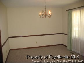5322 Lakeview Road Hope Mills, NC 28348 - Photo 7 of 23 a view of a room with window