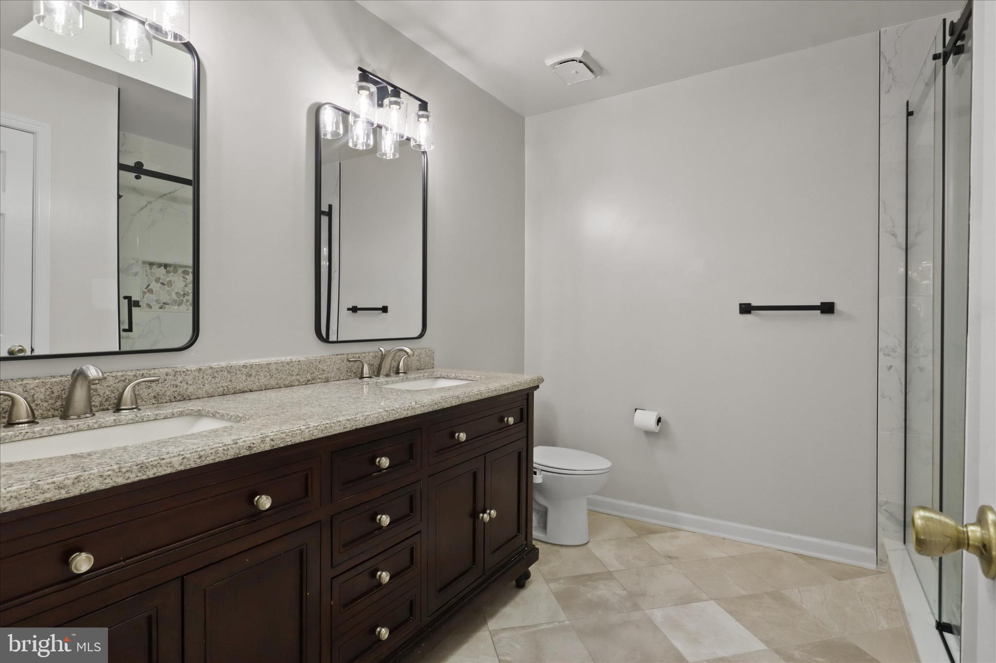 8601 Raglan Road Vienna, VA 22182 - Photo 15 of 47 Owner's Bathroom