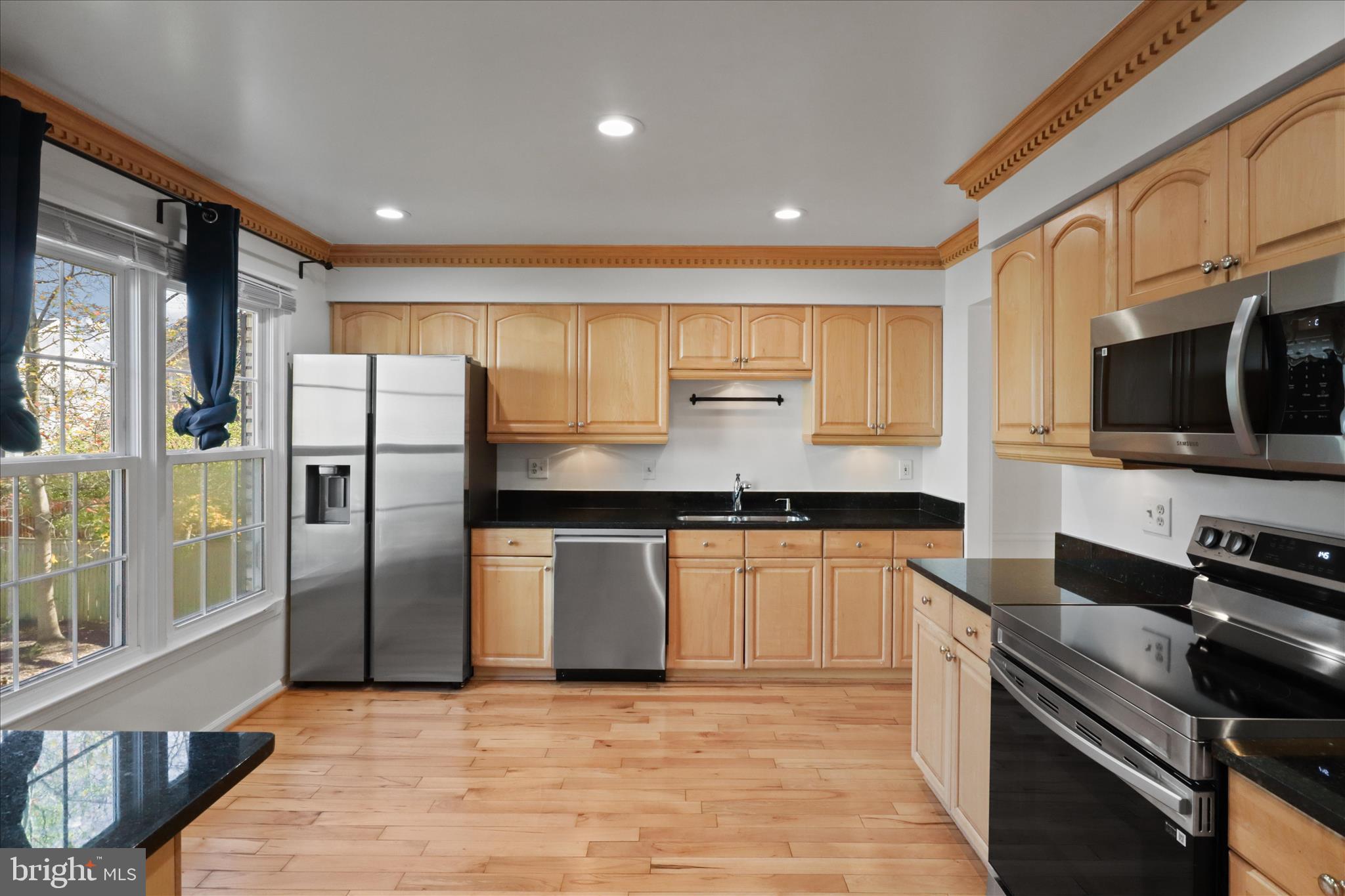 8601 Raglan Road Vienna, VA 22182 - Photo 4 of 47 Remodeled Kitchen with new stainless appliances
