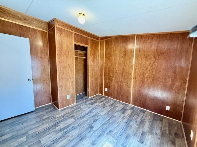 460 Cherokee Trail Ball Ground, GA 30107 - Photo 13 of 23 a view of an empty room with wooden floor