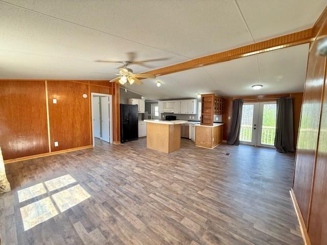 460 Cherokee Trail Ball Ground, GA 30107 - Photo 19 of 23 a view of a big room with wooden floor and windows