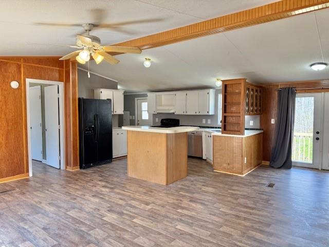 460 Cherokee Trail Ball Ground, GA 30107 - Photo 3 of 23 a kitchen with stainless steel appliances kitchen island granite countertop a refrigerator and a stove top oven