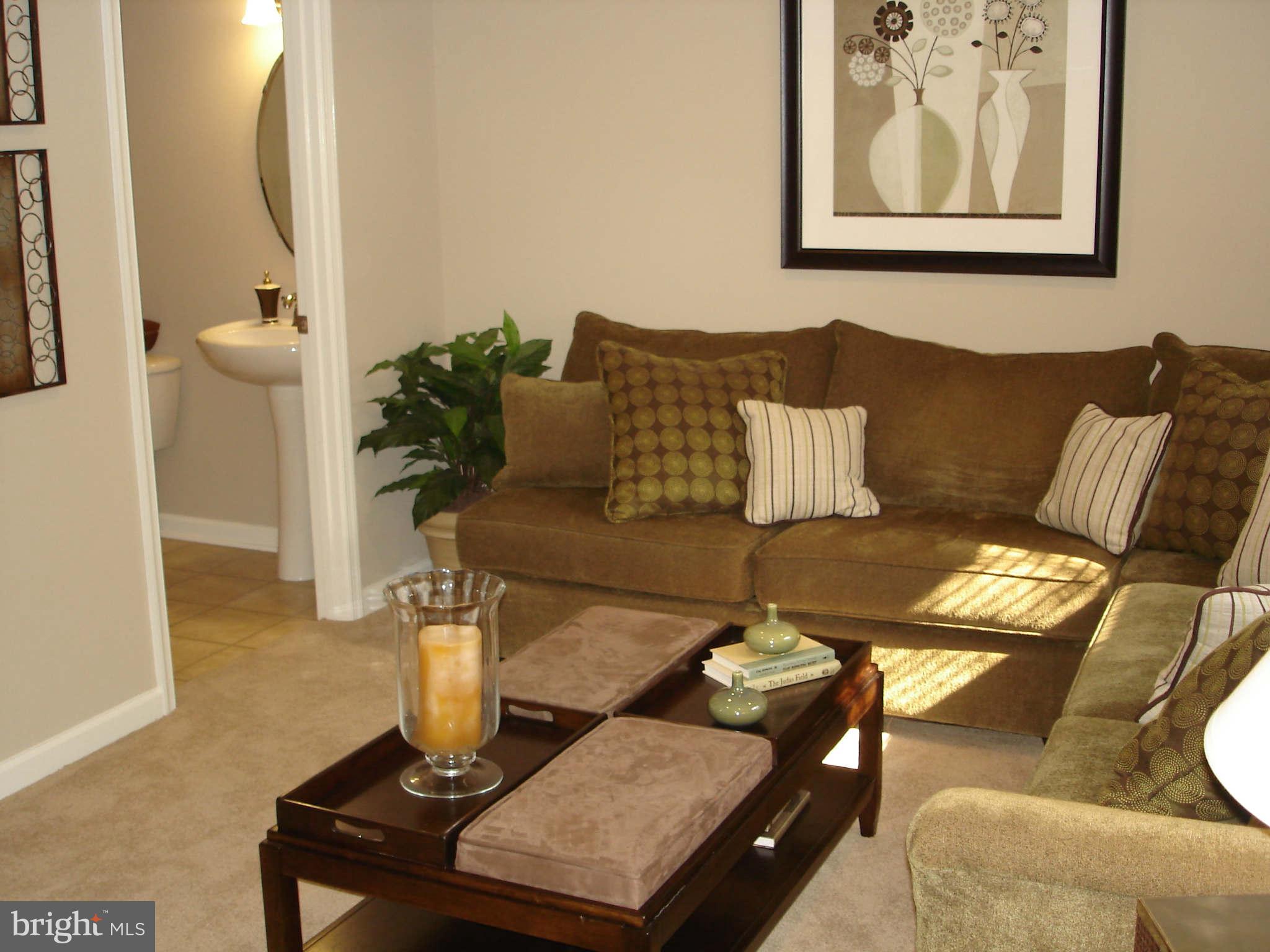 2414 Baileys Pond Road Accokeek, MD 20607 - Photo 12 of 22 a living room with furniture