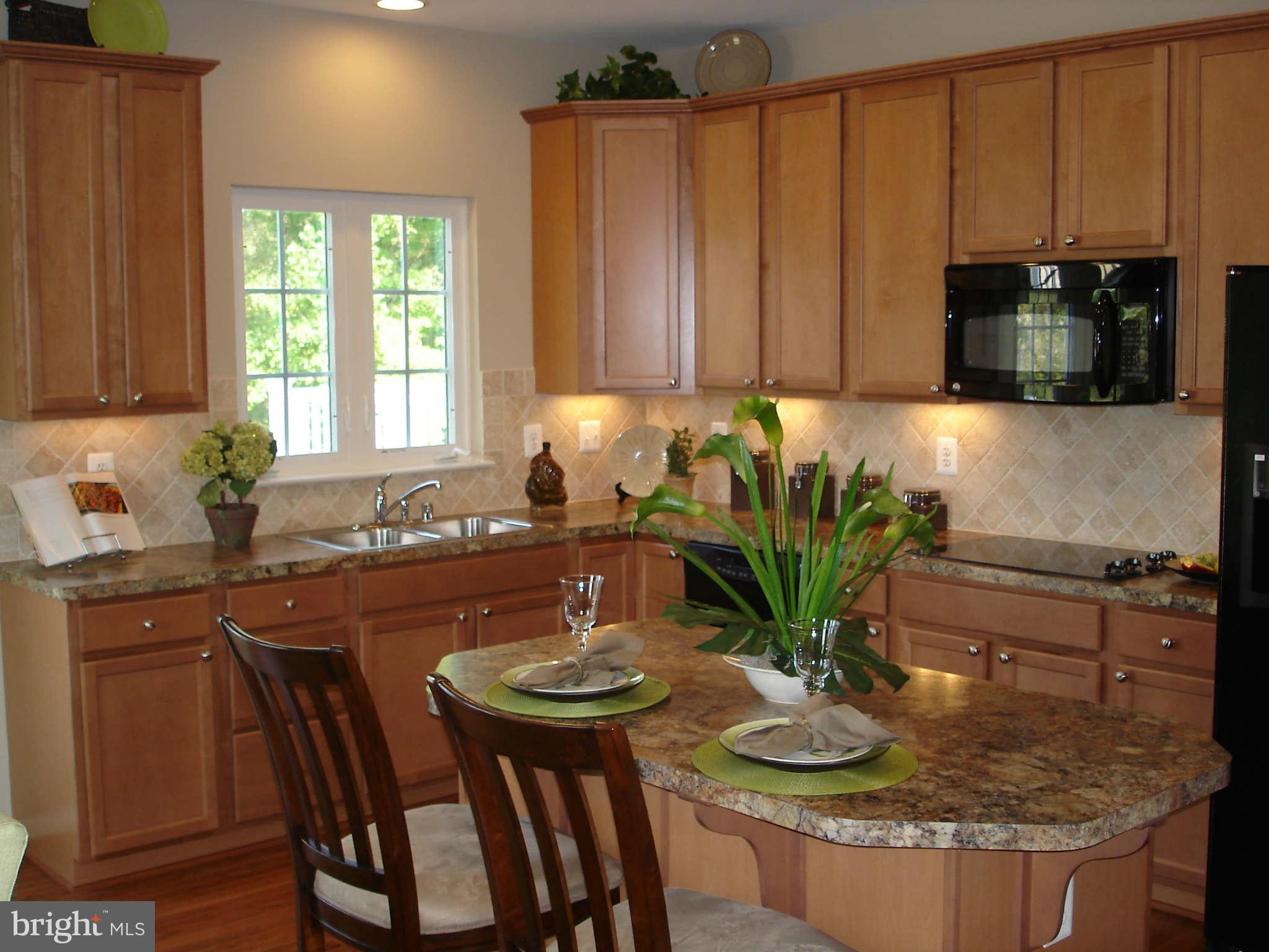 2414 Baileys Pond Road Accokeek, MD 20607 - Photo 3 of 22 a view of a kitchen area