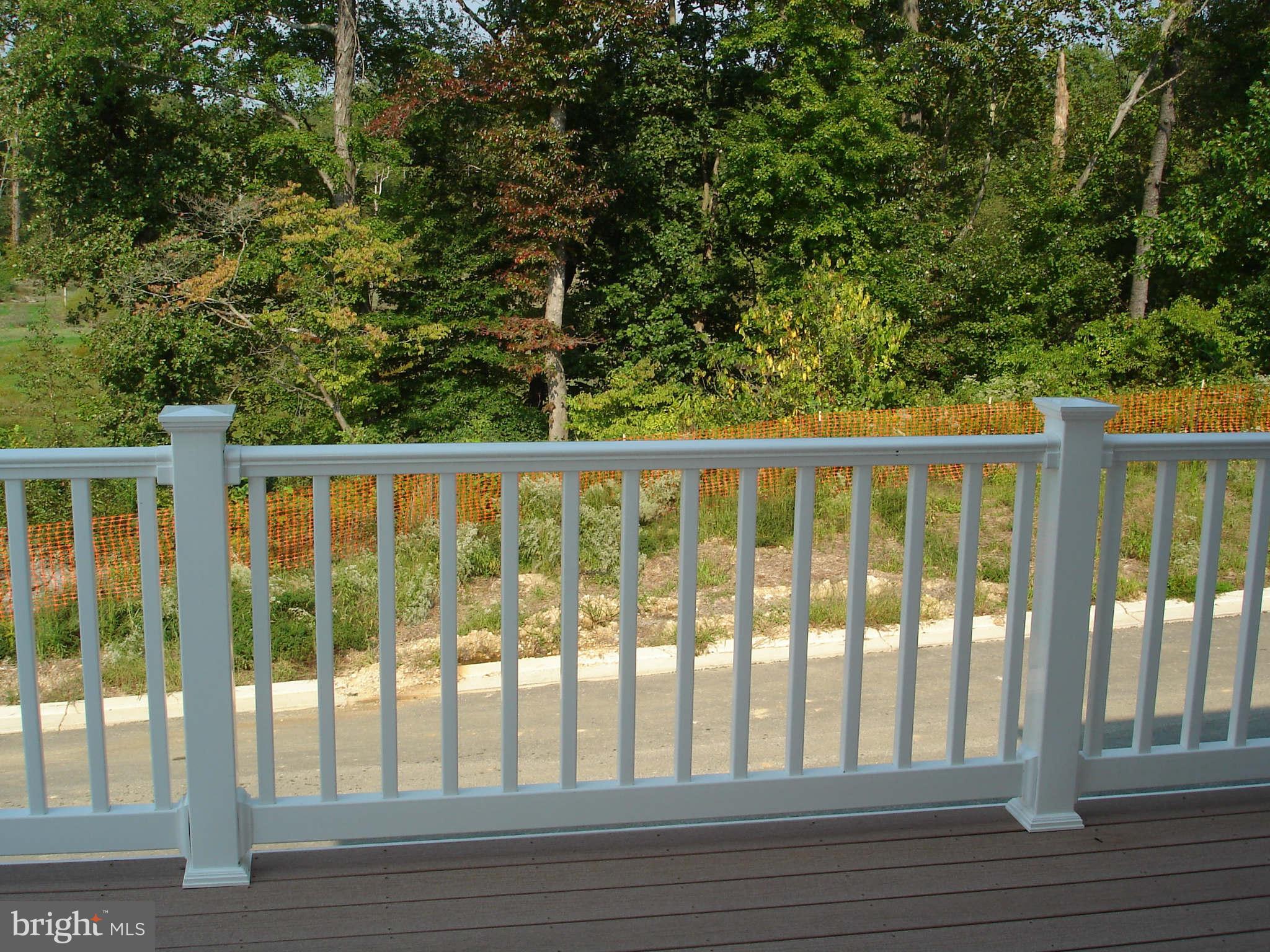 2414 Baileys Pond Road Accokeek, MD 20607 - Photo 5 of 22 a view of a wooden balcony
