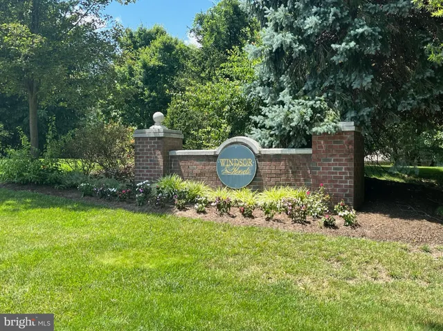 a view of a garden with a fountain