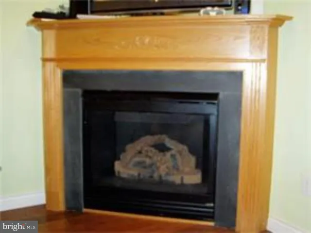 a living room with a fireplace