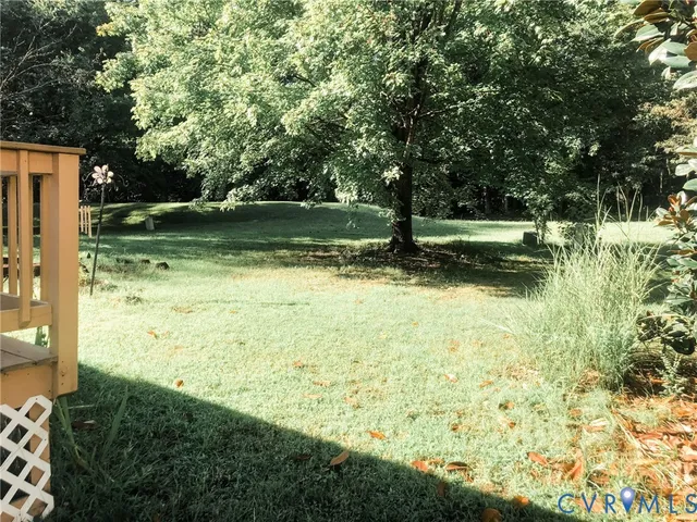 a view of swimming pool with a yard