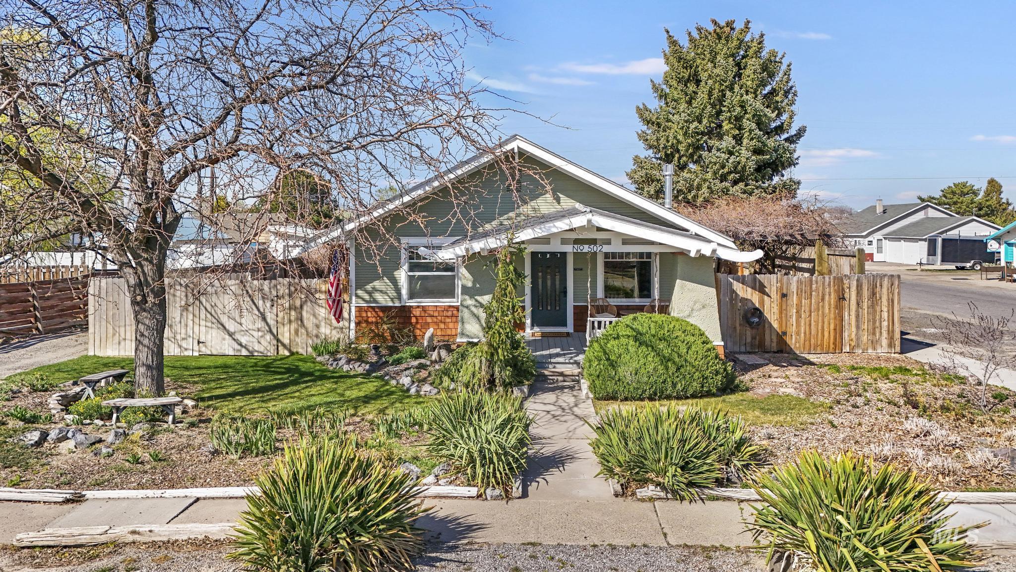 502 6th Street Filer, ID 83328 - Photo 2 of 41 Bungalow-style home with covered porch and brick siding