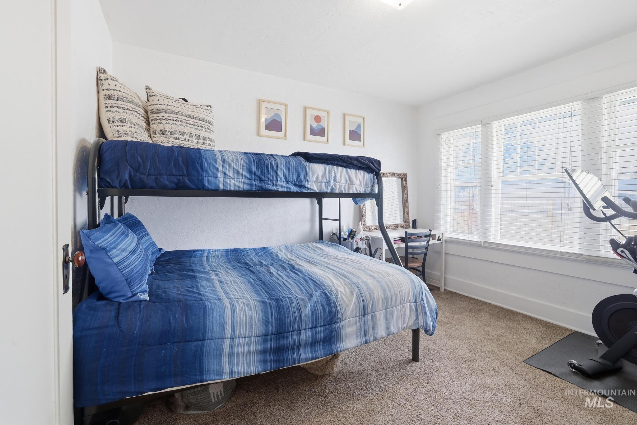 502 6th Street Filer, ID 83328 - Photo 21 of 41 Carpeted bedroom featuring baseboards