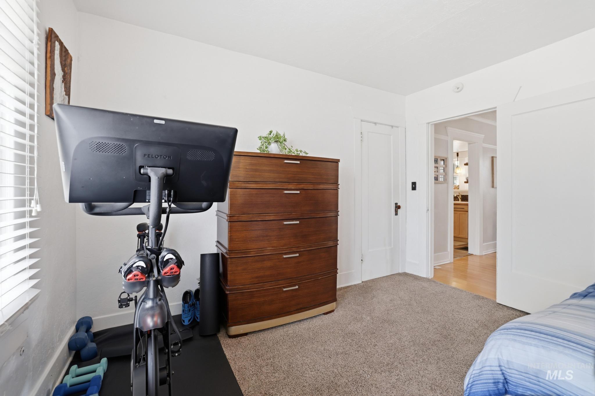 502 6th Street Filer, ID 83328 - Photo 22 of 41 Bedroom with light carpet and a closet