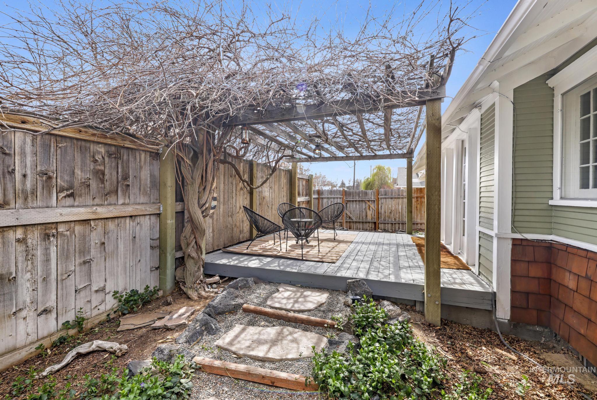 502 6th Street Filer, ID 83328 - Photo 25 of 41 Fenced backyard with a wooden deck
