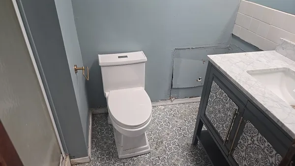 a close view of a toilet in bathroom